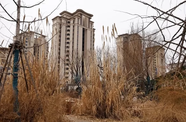 Uneven Way to Complete Abandoned Housing of Evergrande in China